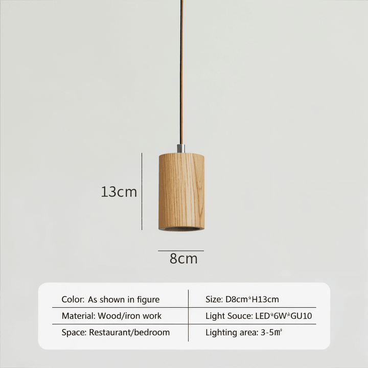 Lampe à suspension cylindrique métallique noire, un élément design pour votre déco intérieure moderne.