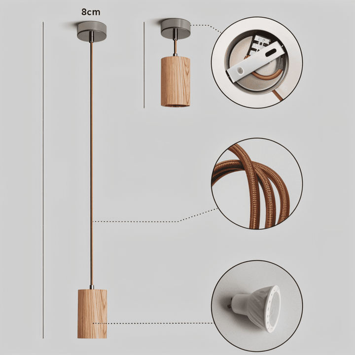 Éclairage intérieur: suspension cylindrique noire mate pour une ambiance contemporaine et chic.