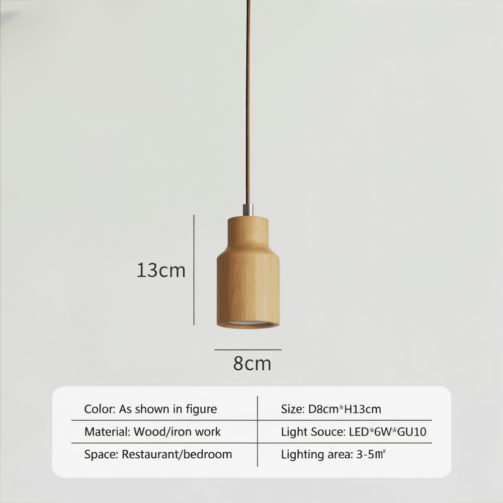 Suspension cylindrique élégante en bois clair, parfaite pour une ambiance scandinave et chaleureuse.