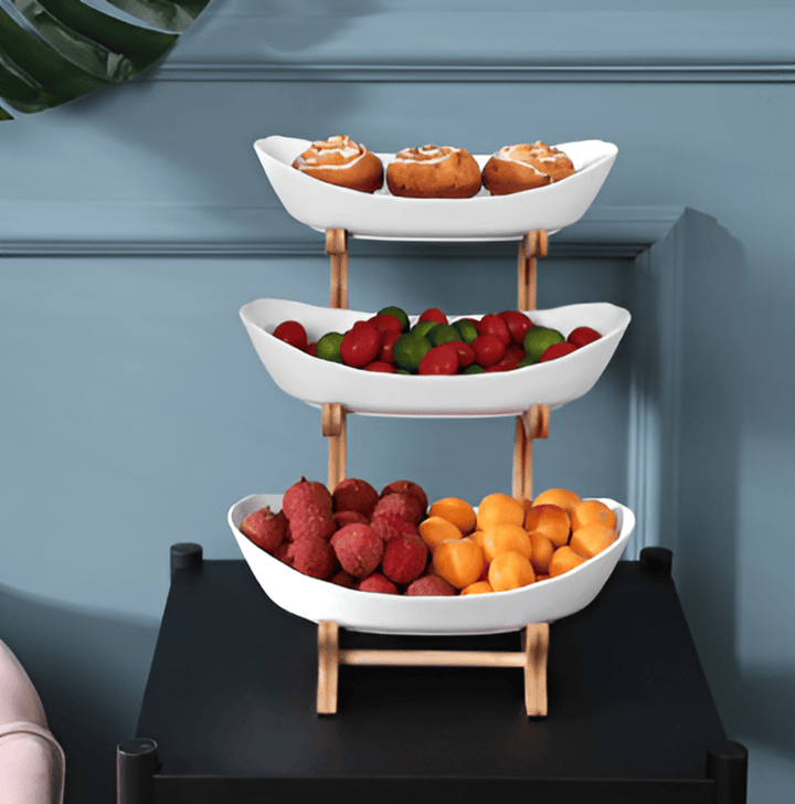 Bol à fruits design moderne vert. Parfait pour un rangement frais et accessible dans la cuisine.
