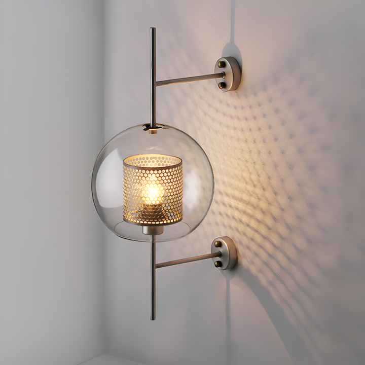 Gros plan sur l'applique murale LED Hexara argent, design ruche, lumière ambiante décorative.