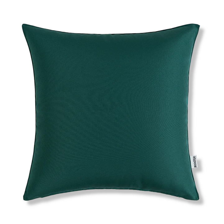 Housse coussin 45x45 cm déperlante sur fauteuil de terrasse, avec fermeture éclair discrète.