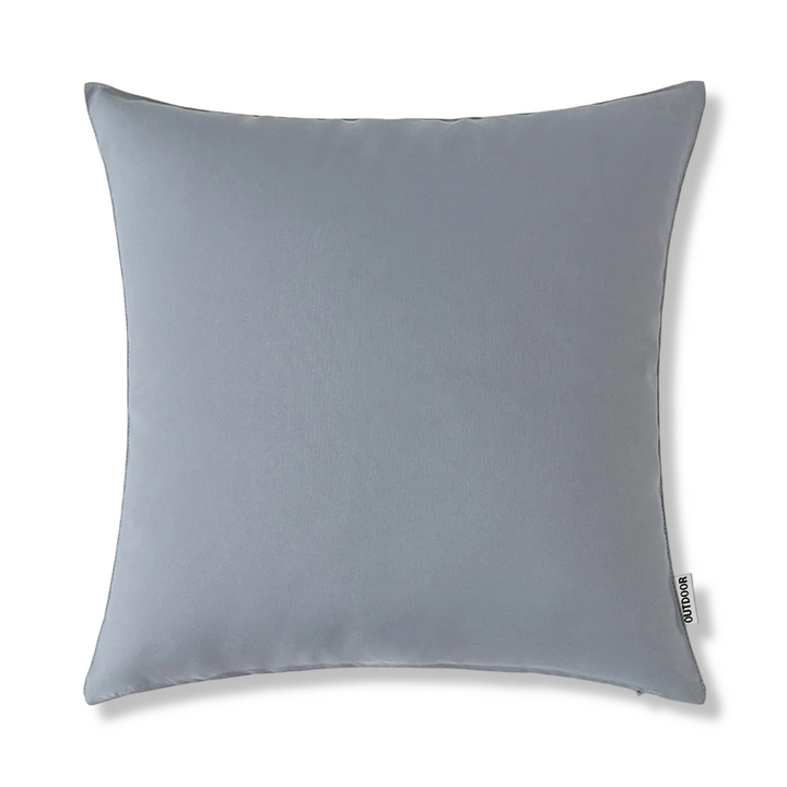 Gouttes d'eau perlant sur une housse de coussin d'extérieur 45x45 cm déperlante, effet lin.