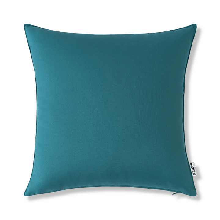 Housse coussin déperlante 45x45 cm pour extérieur, résistante aux intempéries et facile d'entretien.
