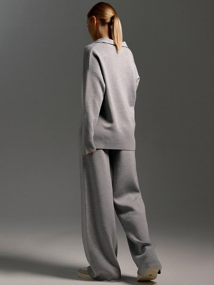 Loungewear femme moderne : ensemble pull polo et pantalon large pour une tenue décontractée stylée.
