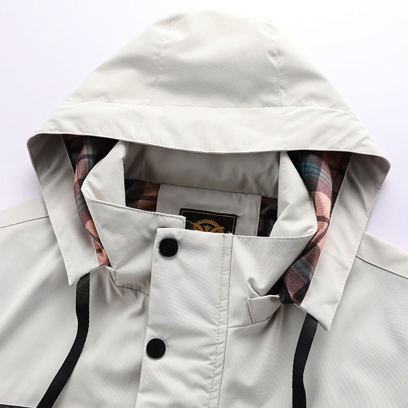 Veste sport homme, coupe-vent déperlant, parfaite pour activités outdoor et entraînement.