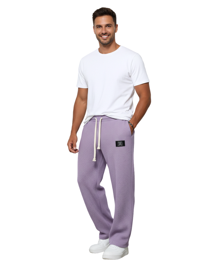 Pantalon homme confortable, coupe ample, ajustable, idéal pour toutes saisons avec style moderne.