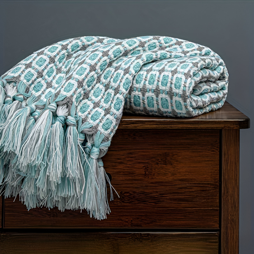 Jeté confortable en polaire, franges et esprit vintage, pour une décoration cosy et intemporelle.