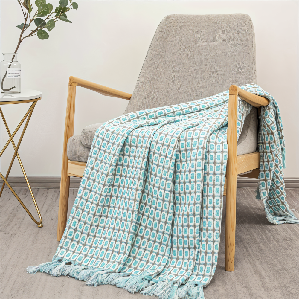 Jeté de canapé vintage en polaire douce avec franges décoratives, apporte style et chaleur à votre salon.