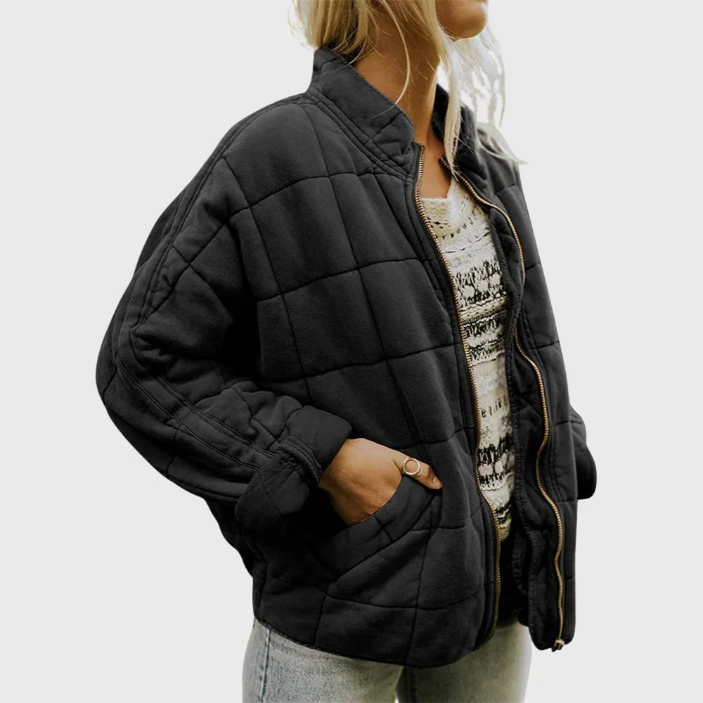 Veste matelassée femme avec fermeture éclair, décontractée et stylée, polyvalente pour toutes saisons.