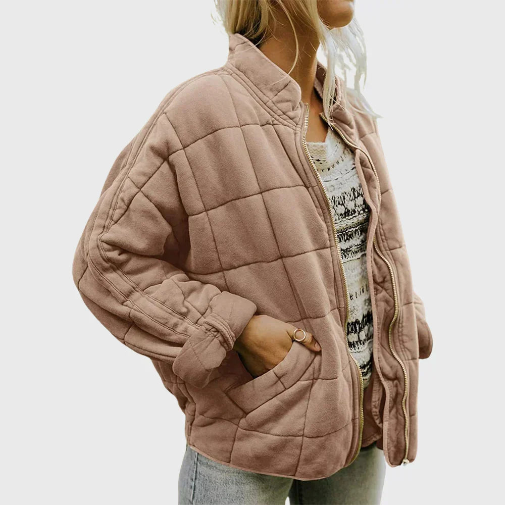 Veste matelassée femmes, col montant élégant, fermeture éclair pratique, confort décontracté.