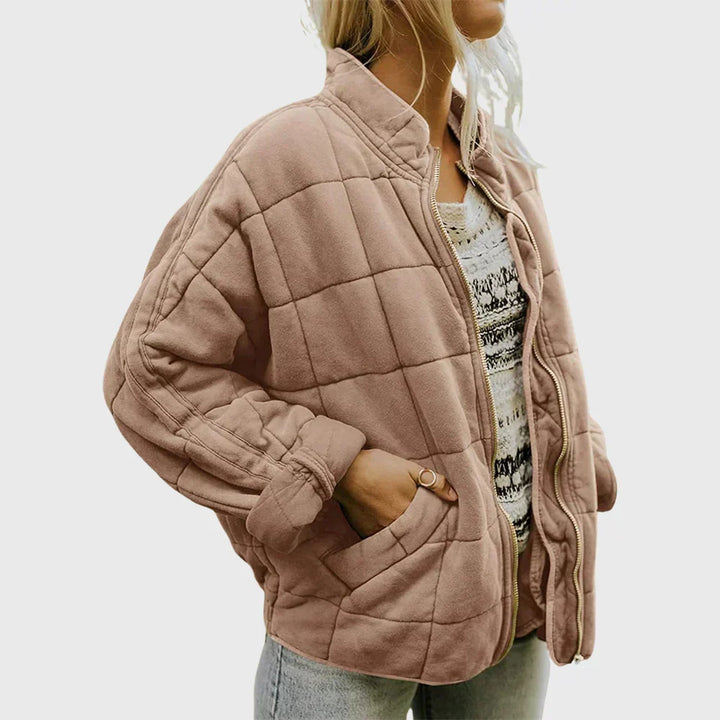 Veste matelassée femmes, col montant élégant, fermeture éclair pratique, confort décontracté.