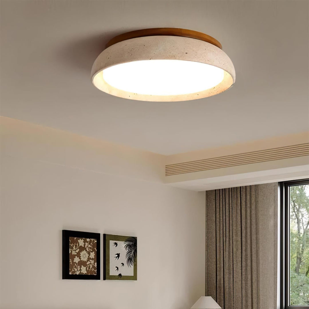 Lampe LED ronde en travertin, éclairage naturel et économe pour une maison moderne.
