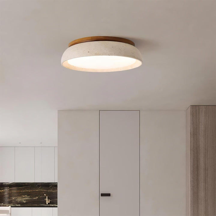Plafonnier moderne rond en travertin naturel pour salon, décoration intérieure raffinée.