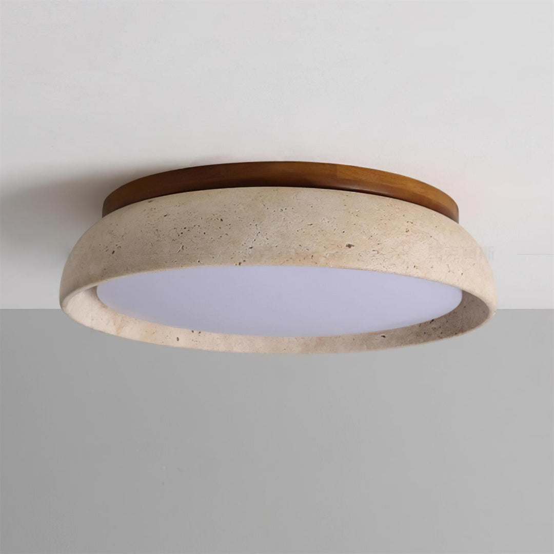 Éclairage LED rond en travertin, combine modernité et nature pour votre décoration.