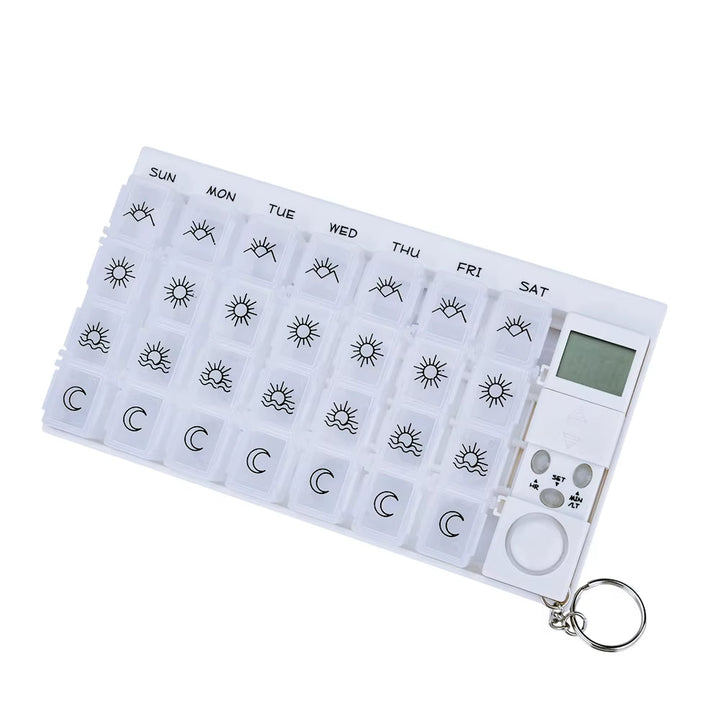 Distributeur de pilules intelligent unisexe avec alarme programmable pour une gestion quotidienne facile des médicaments.