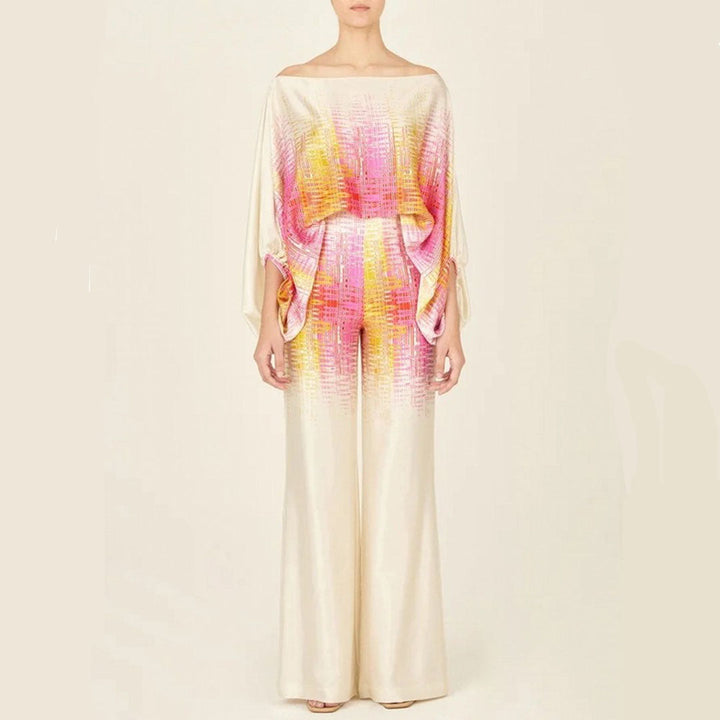 Ensemble femme fluide et élégant : top off-shoulder et pantalon large taille haute. Idéal pour un look chic d'été.