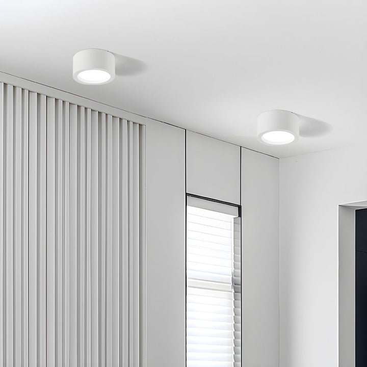 Éclairage de plafond LED cylindrique contemporain, idéal pour une ambiance moderne et épurée.