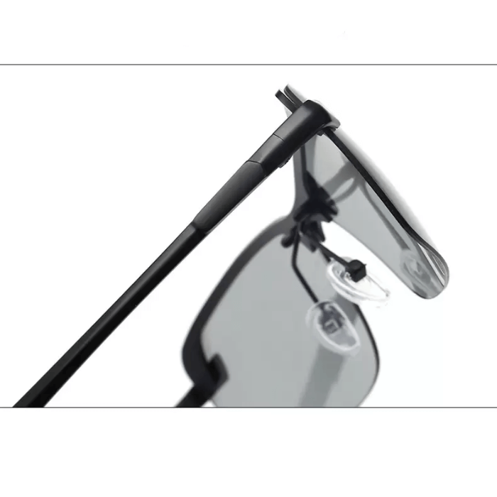 Paire de lunettes de soleil photochromiques polarisantes pour homme, réduisant l'éblouissement, protégeant du soleil.