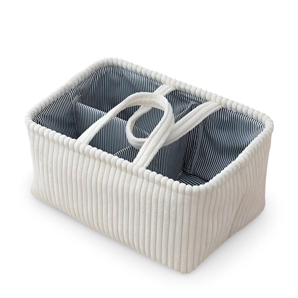 Panier de rangement bébé avec compartiments pour couches, produits de soin et jouets, parfait pour chambre et crèche.
