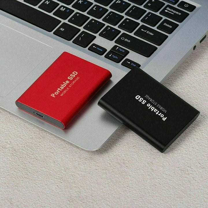 Transfert de données rapide avec ce SSD portable USB. Stockage externe fiable pour vos fichiers importants.
