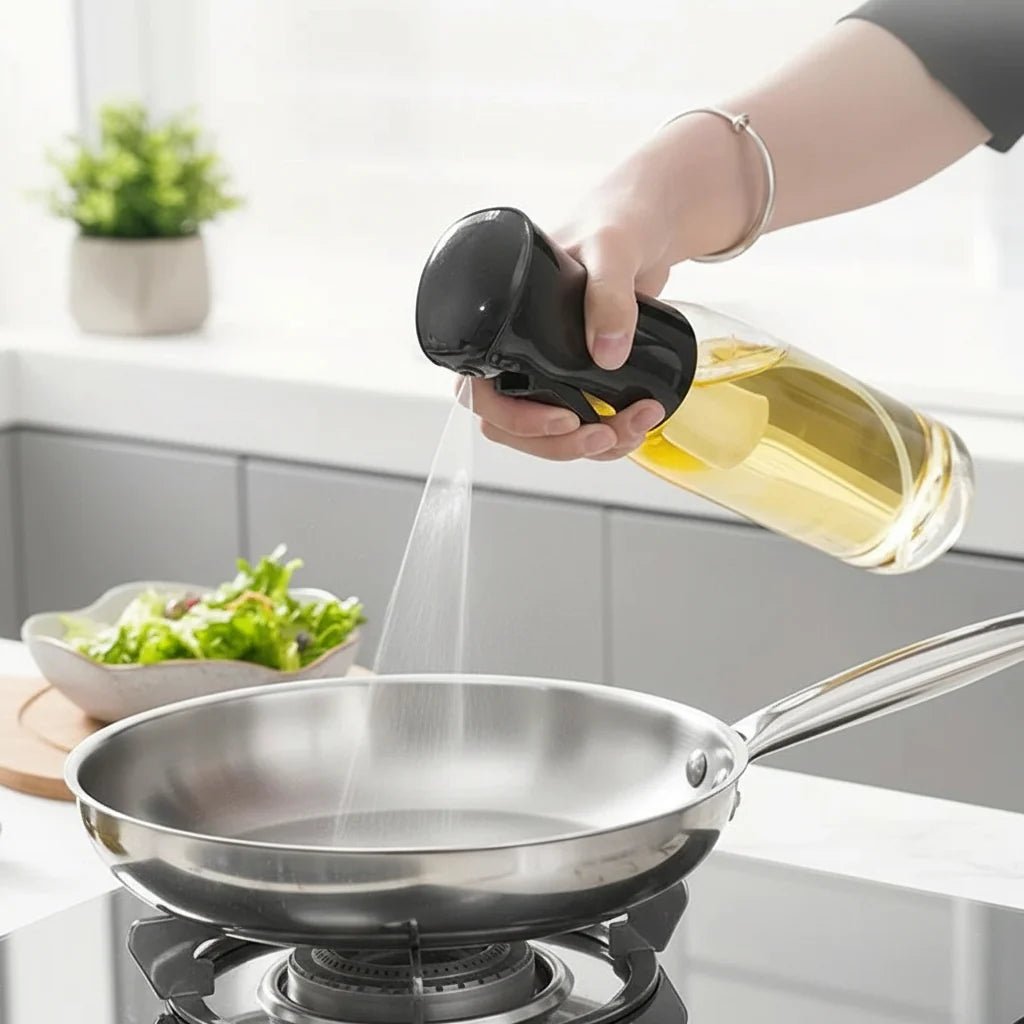 Pulvérisateur d'huile de cuisine en acier inoxydable pour cuisson saine et précise.