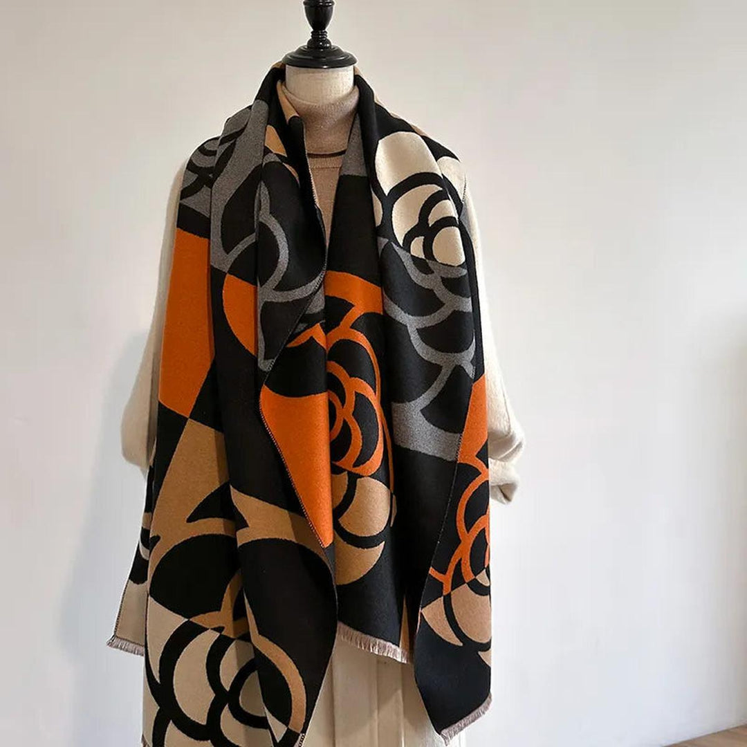 Accessoire de mode: écharpe femme réversible en cachemire imprimé, parfaite pour diversifier vos tenues.