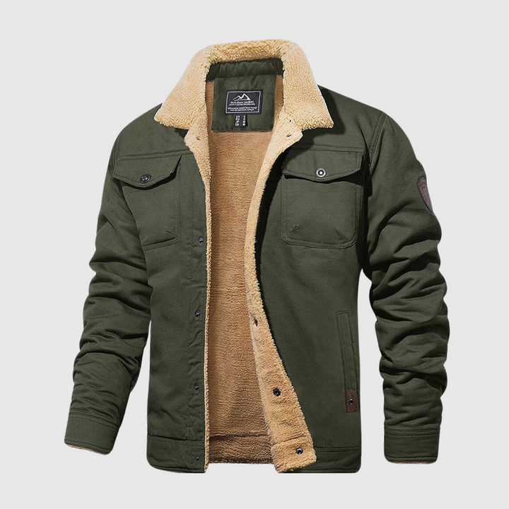 Homme portant une veste bombardier matelassée Logan. Look hiver mode décontracté, élégant et chaud.
