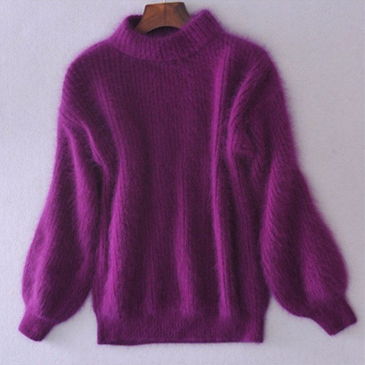 Pull femme à manches bouffantes, col-montant, doux et élégant pour l'hiver.