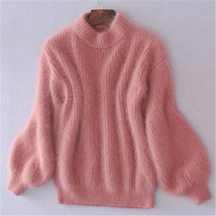 Pull hivernal femme en maille douce, confortable et élégant.