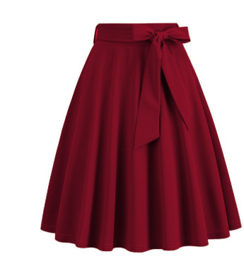 Silhouette évasée d'une jupe midi A-line femme, taille haute avec détail nœud. Mode chic pour toute occasion.