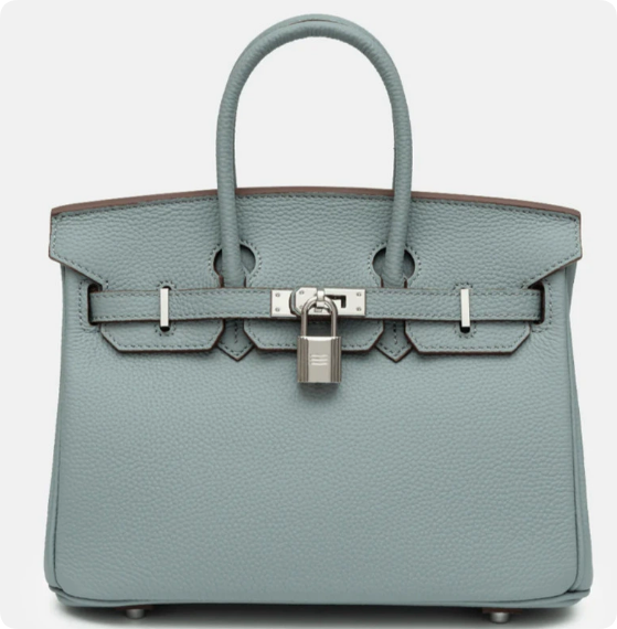Sac à main élégant en cuir noir pour femme, accessoire mode essentiel, parfait pour un style chic et organisé.