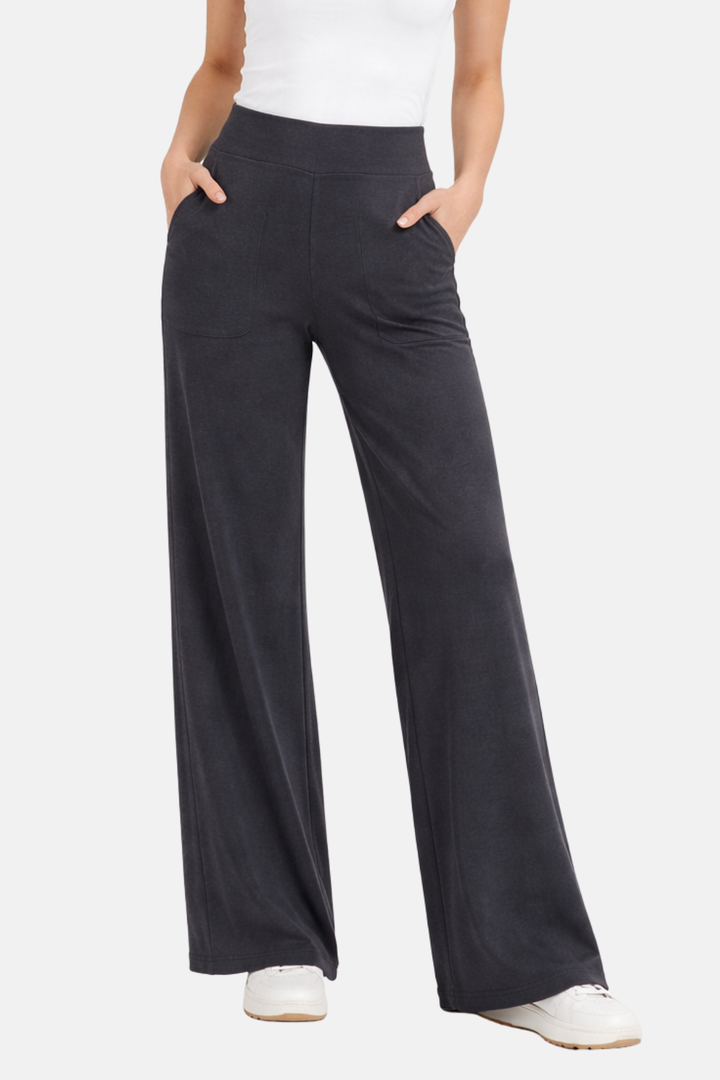 Pantalon stretch femme noir taille haute, élégant et confortable pour le quotidien.