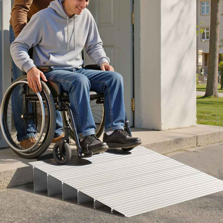 Rampe de seuil en caoutchouc pour fauteuil roulant et chariot. Améliore la mobilité et l'accès PMR.
