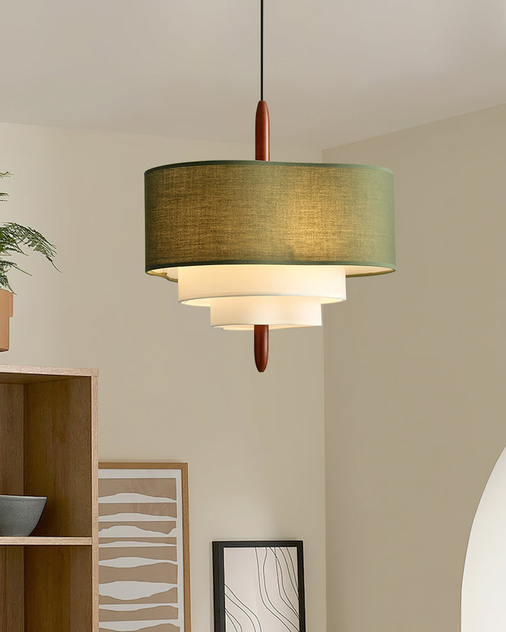 Luminaire en tissu rond pour suspension, apporte une lumière chaude et agréable.