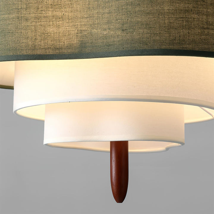 Luminaire décoratif rond en tissu, suspension contemporaine pour éclairage doux.