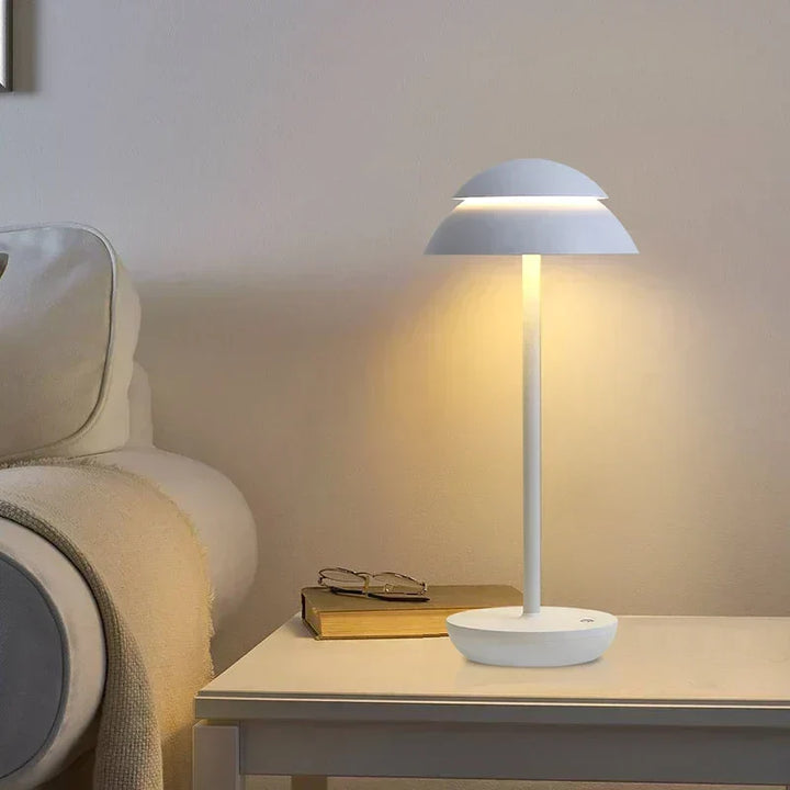Lampe de table LED sans fil rechargeable, design moderne gris. Luminosité réglable pour bureau, chambre ou salon.