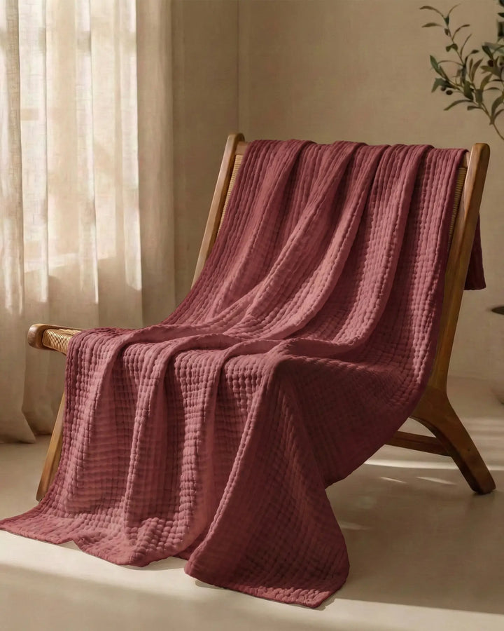 Jeté de canapé en coton, respirant et doux, idéal pour la détente et la décoration.