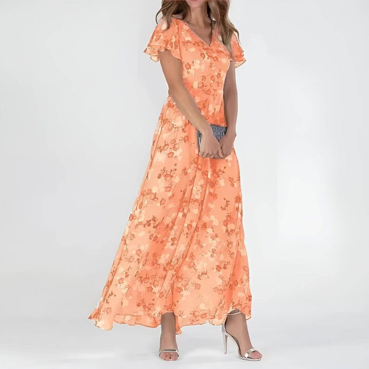 Robe maxi fleurie élégante femme, décolleté V fluide, style romantique. Idéale pour l'été et la mode féminine chic.