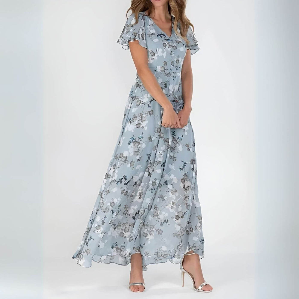 Robe maxi d'été fleurie avec décolleté V, fluide et chic. Parfaite pour les vacances, style printanier et féminin.