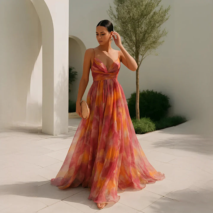 Robe longue fluide femme élégante à motif floral, parfaite pour l'été ou les vacances.