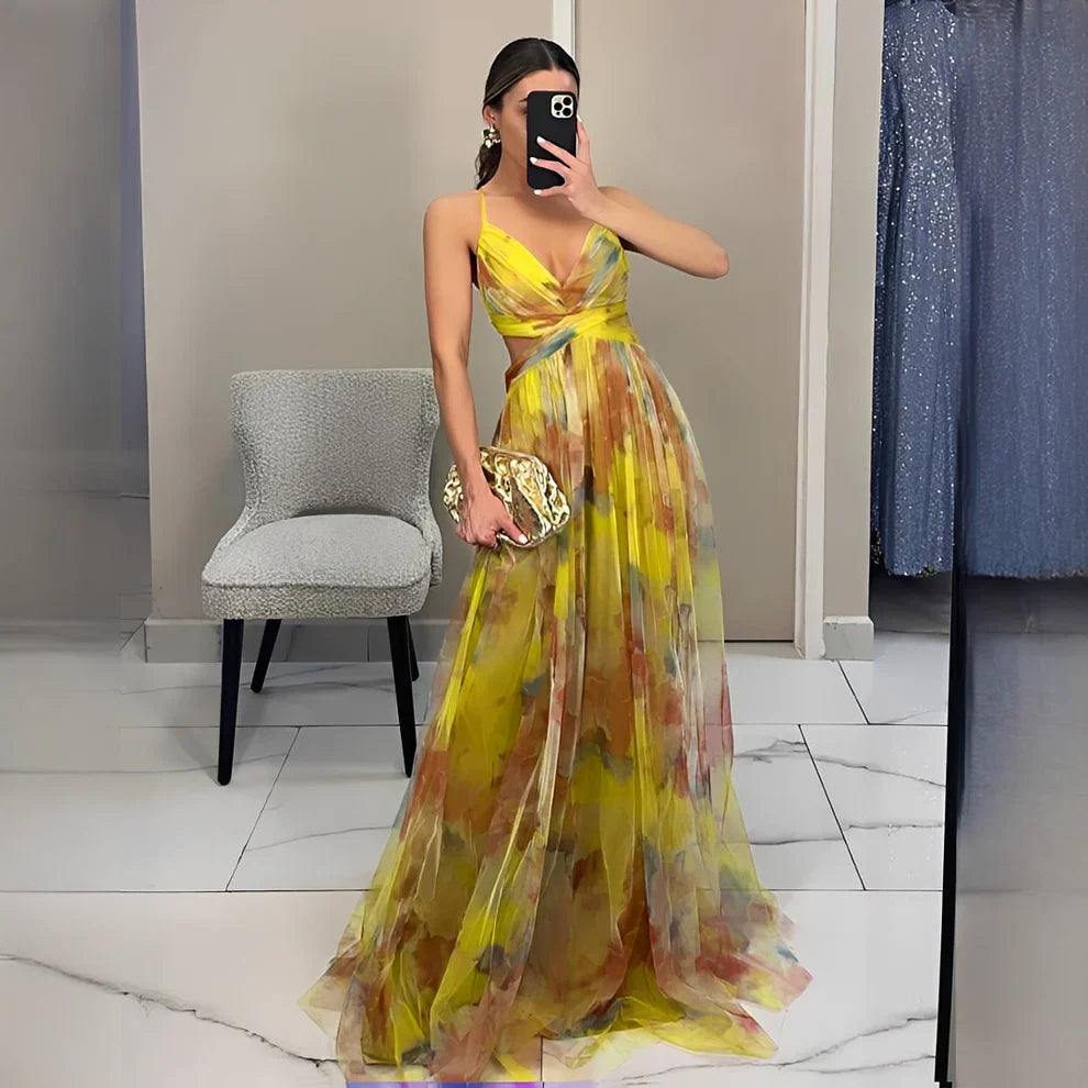 Robe d'été fluide femme motif floral, style bohème, idéale pour les vacances ensoleillées.