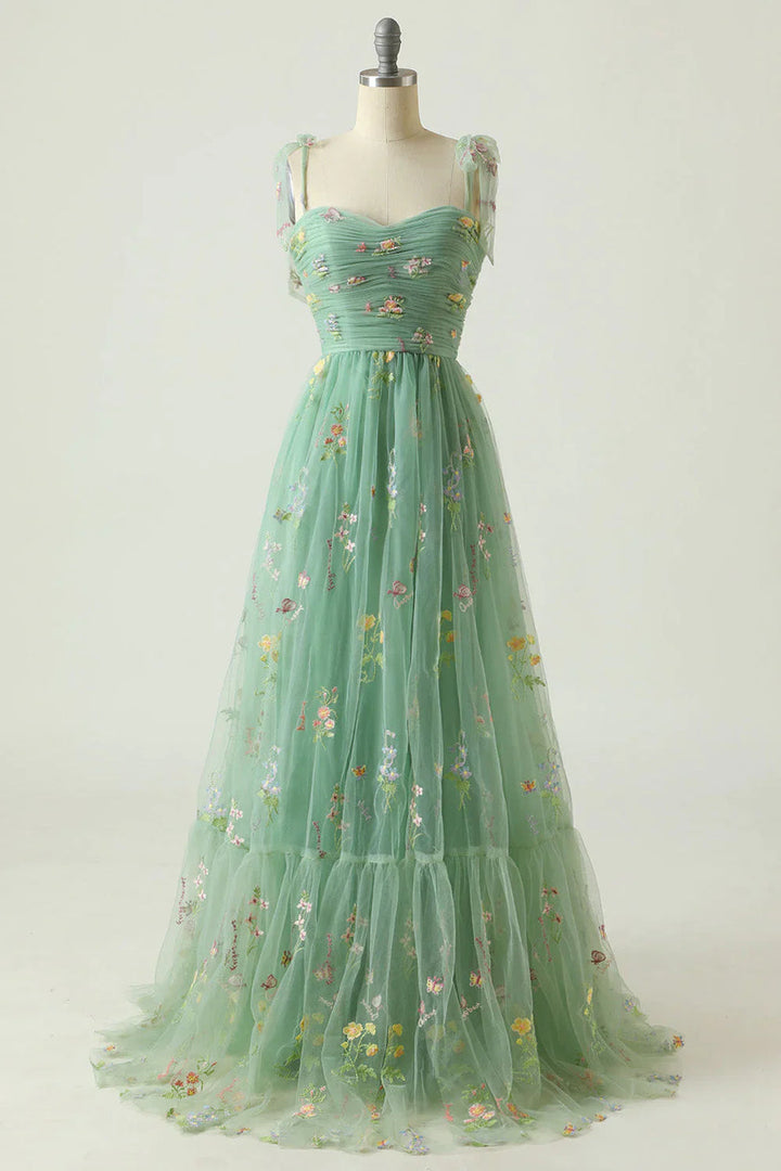 Robe longue femme élégante à imprimé floral, parfaite pour soirée chic ou cérémonie. Style fluide habillé.