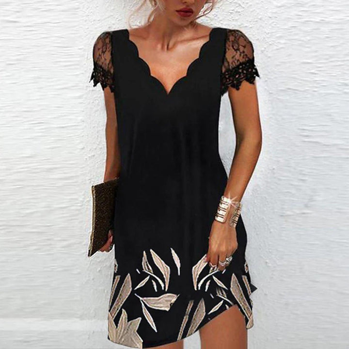 Robe midi femme élégante et tendance, col V, manches courtes. Disponible en grande taille. Pour soirée ou cérémonie.