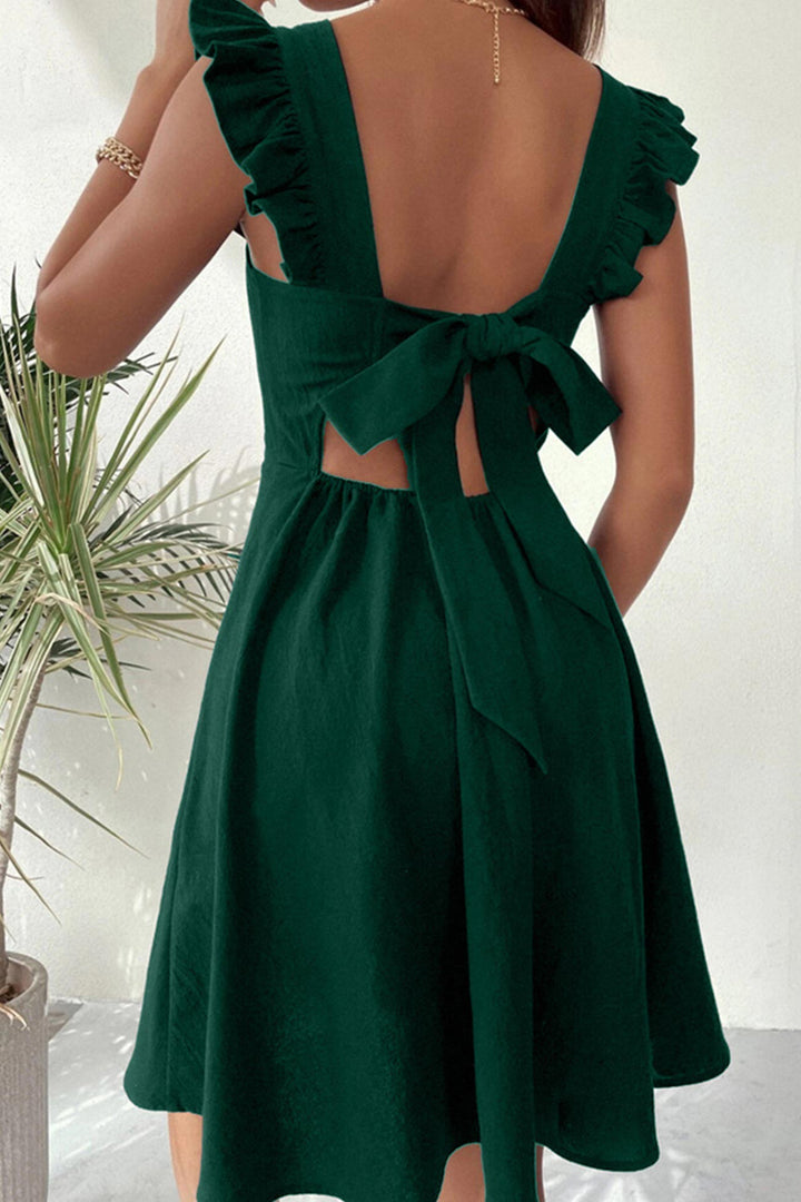 Mini-robe femme décontractée avec dos noué, parfaite pour l'été et les vacances.