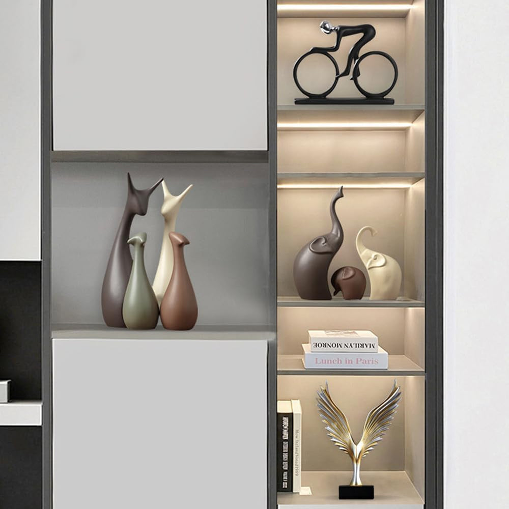 Quatre figurines cerf décoratives style rustique, parfaites pour la décoration intérieure ou extérieure.