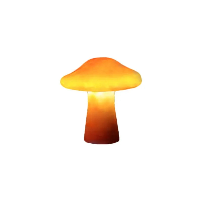 Détail d'une lampe de jardin LED champignon orange, en résine avec lumière chaude. Décoration extérieure unique.