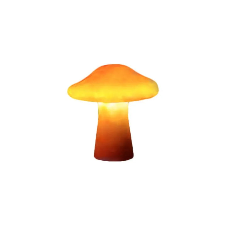 Détail d'une lampe de jardin LED champignon orange, en résine avec lumière chaude. Décoration extérieure unique.