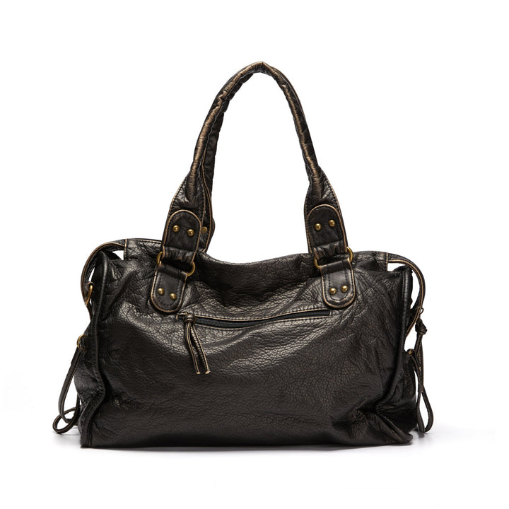 Sac cabas noir vintage pour femme active ou étudiante, grand espace de rangement en similicuir.