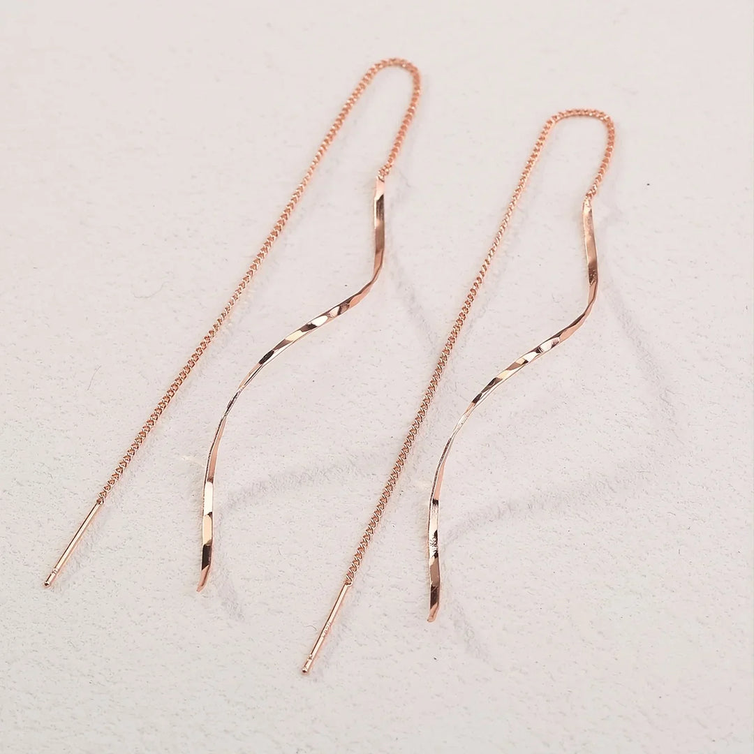 Boucles d'oreilles pendantes vagues en argent, design incurvé, bijoux élégants pour femmes.